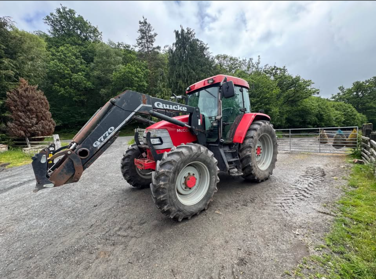 2004 McCormick MC115 with Quicke Q770 tractor (no vat)
